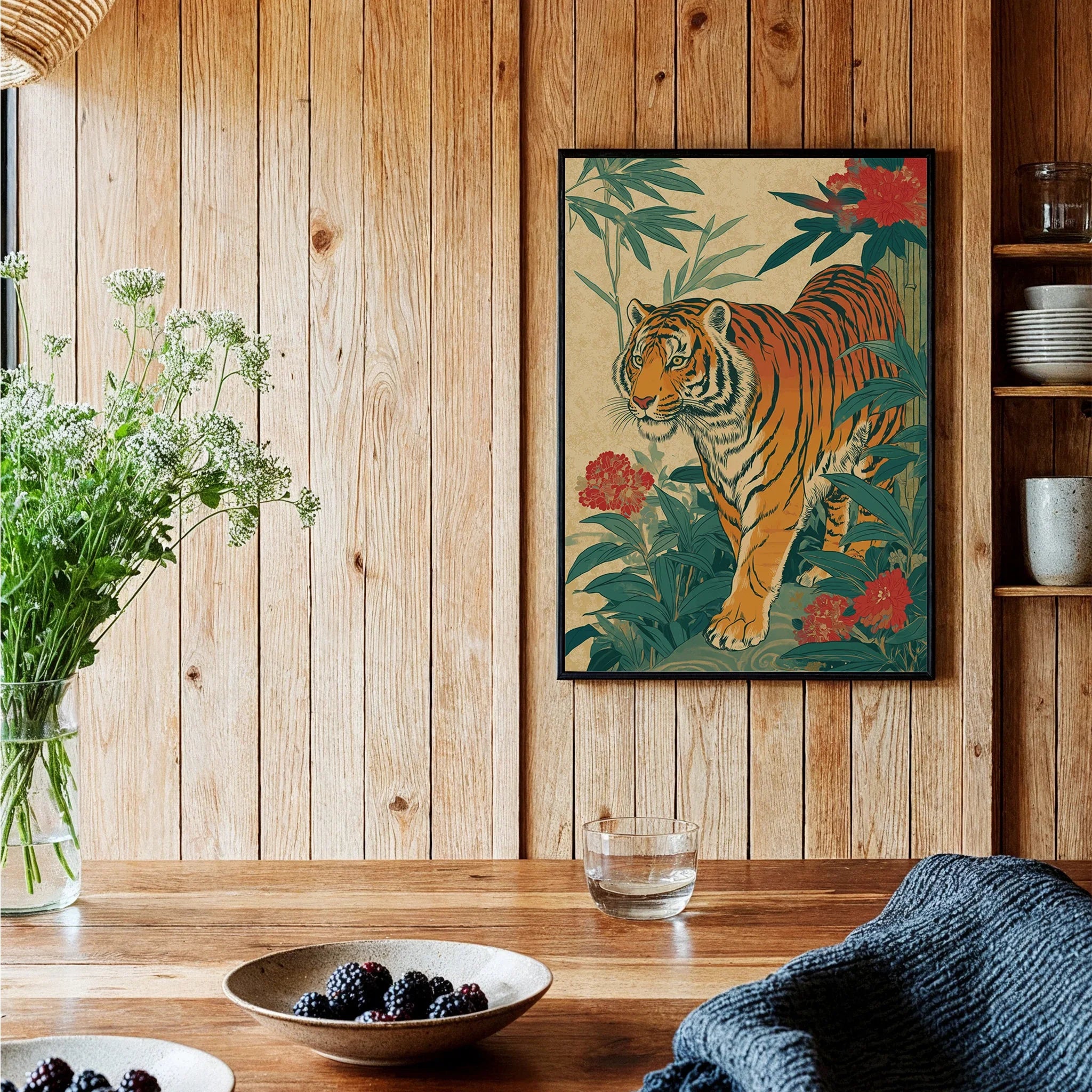 Framed Japanese tiger art print in rustic kitchen with wooden walls and fresh flowers