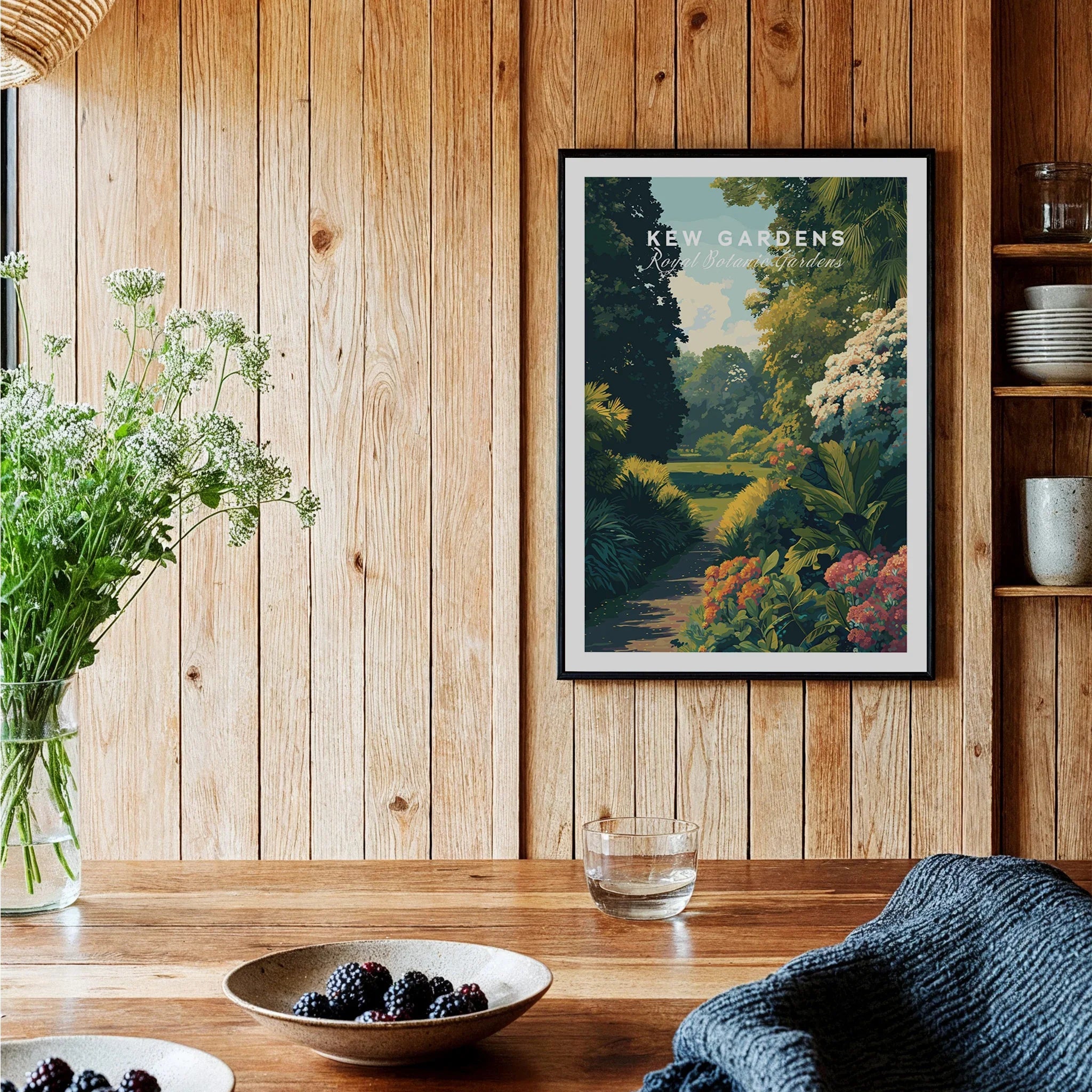 Framed Kew Gardens botanical art print on wood-paneled kitchen wall with natural decor