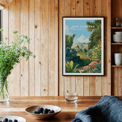 Kew Gardens botanical travel poster art print in a black frame displayed in a rustic kitchen.