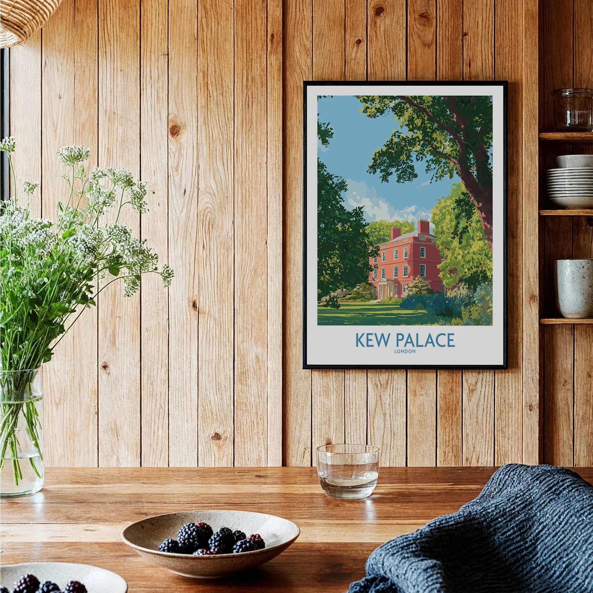 Kew Palace London travel poster art print in black frame on rustic wooden kitchen wall
