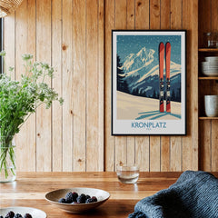 Framed Kronplatz travel art print in rustic kitchen with wooden walls and modern decor