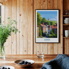 Lewes England travel poster framed on wooden kitchen wall, rustic decor, table with berries