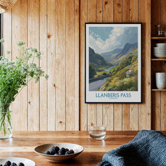 Llanberis Pass art print in black frame on wood kitchen wall, rustic home decor setting