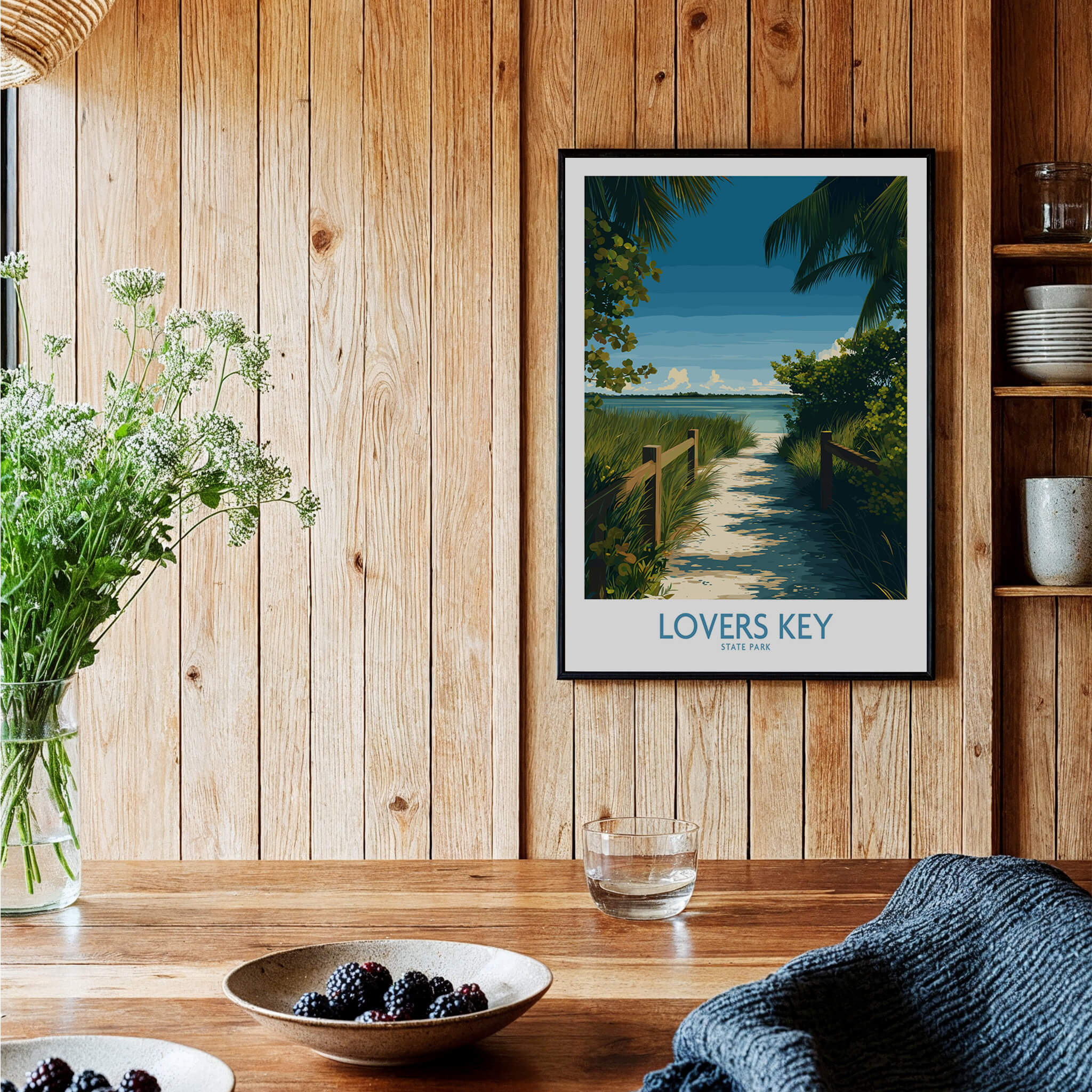 Lovers Key Florida Poster | Tropical Nature Path Canvas Print hung on a wooden wall with a cozy dining setup.
