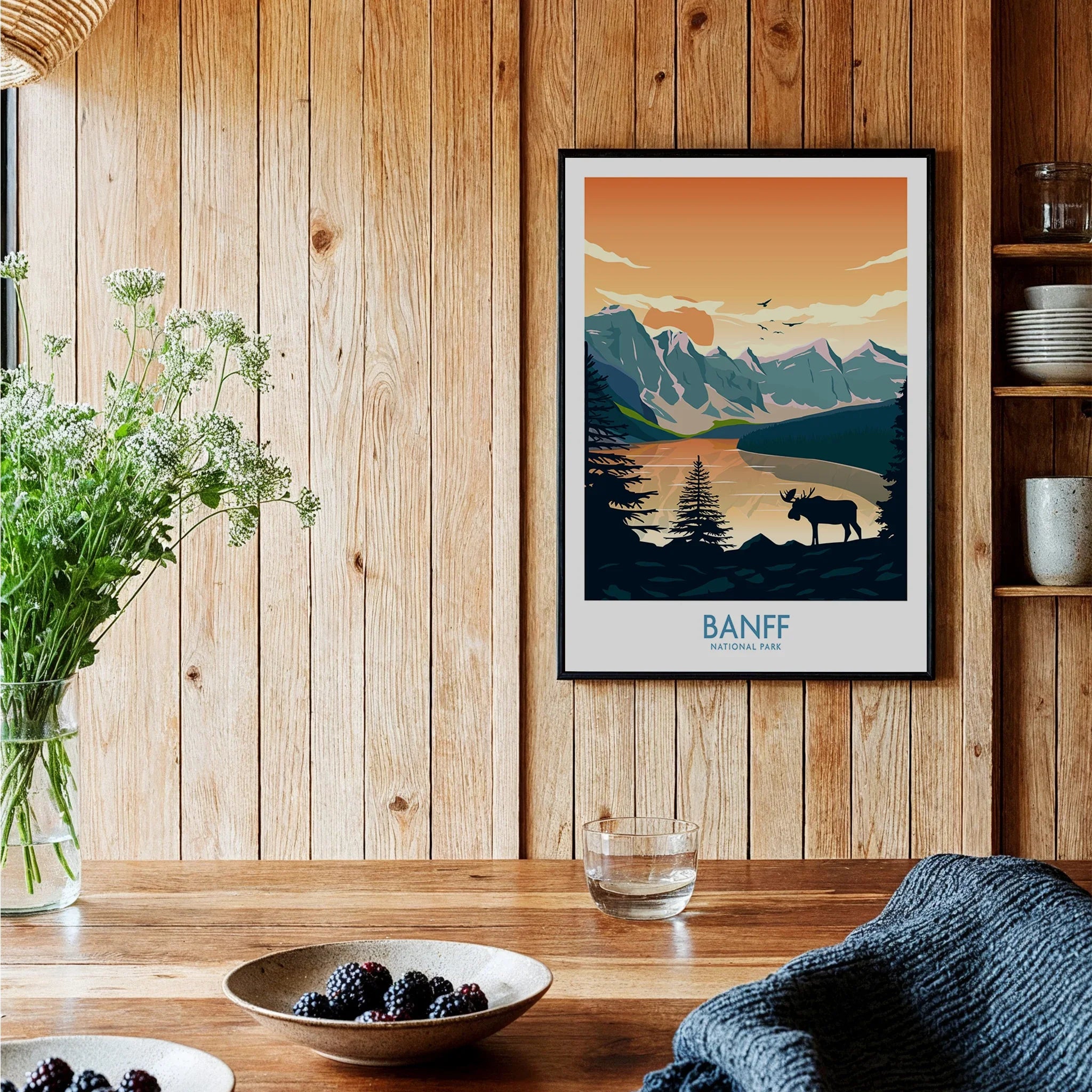 Banff National Park art print with moose silhouette on rustic kitchen wood wall, cozy decor
