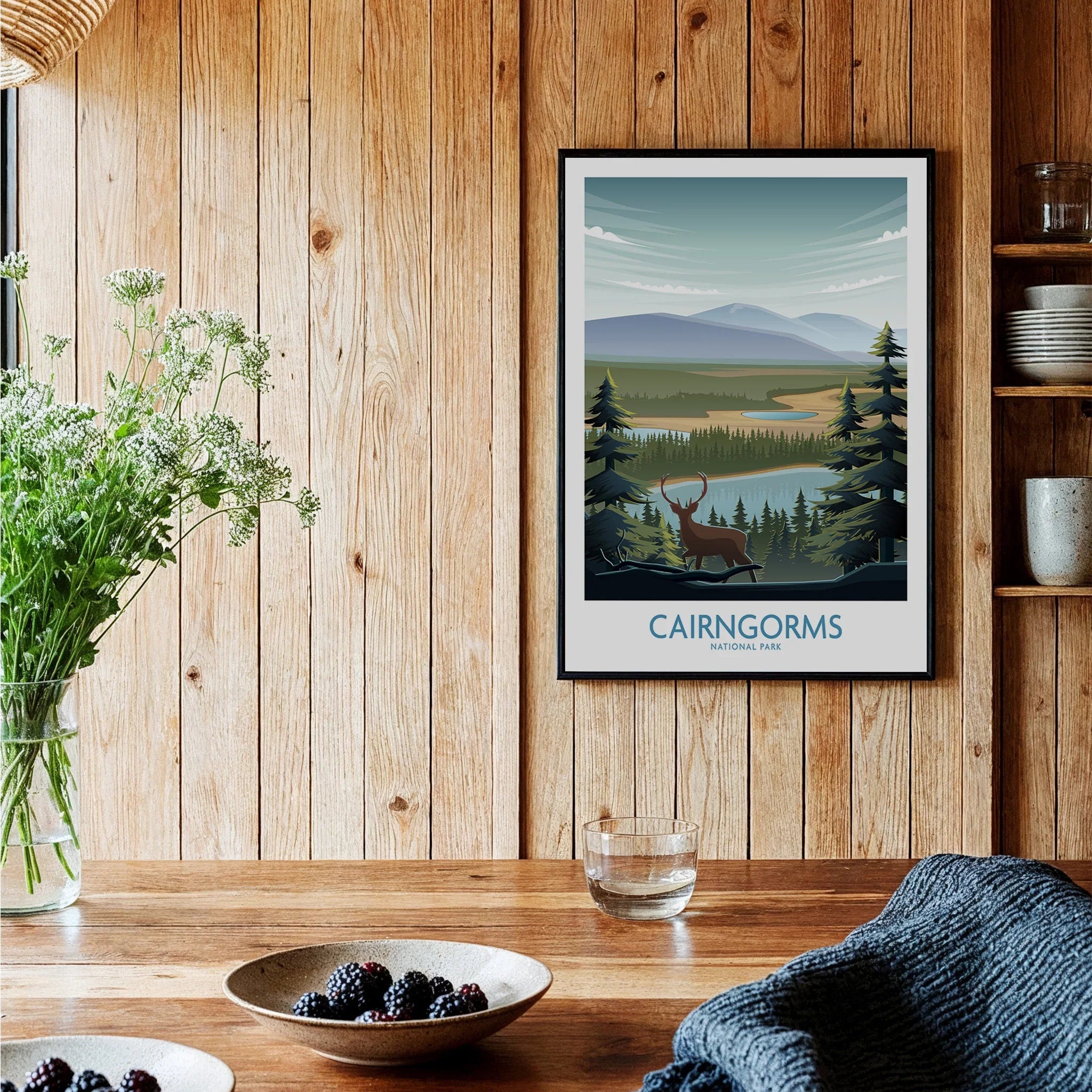 Cairngorms National Park art print with deer and pine trees in modern wooden kitchen decor