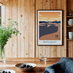 Framed Death Valley National Park art print on wood wall in cozy kitchen decor setting