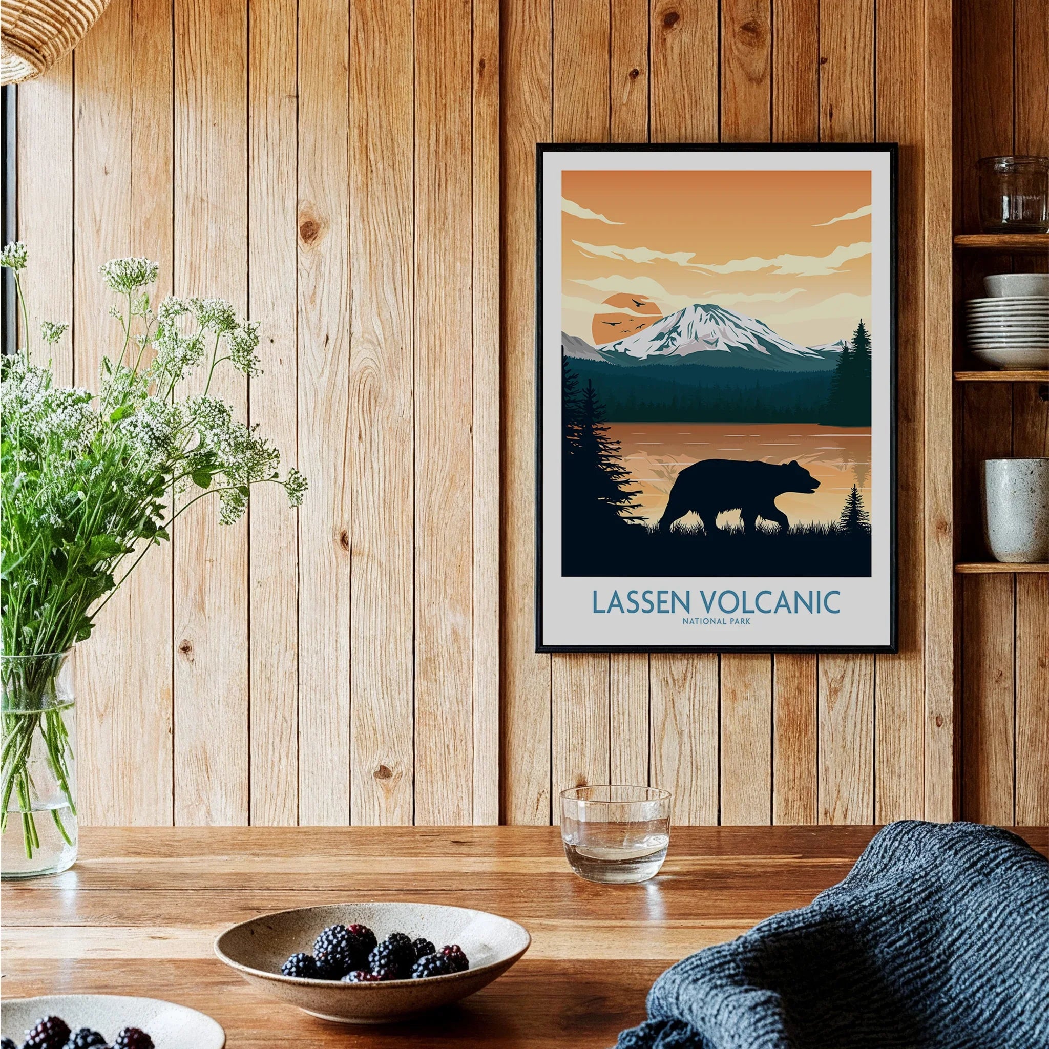 Framed Lassen Volcanic National Park art print with bear and mountain in rustic kitchen