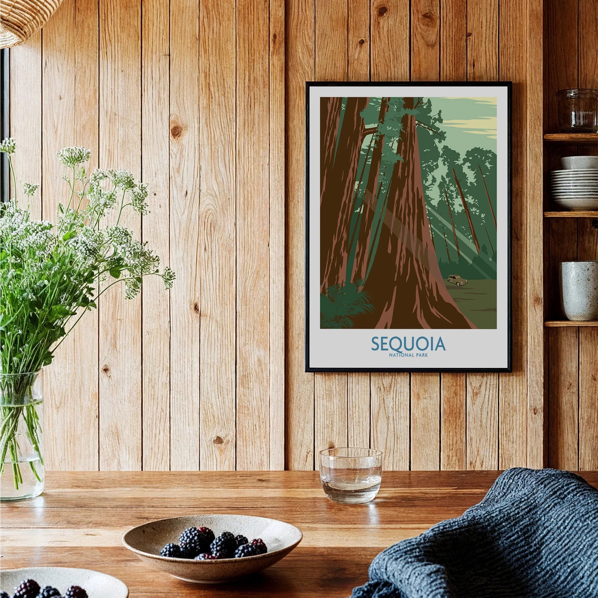Sequoia National Park art print with tall trees framed on wooden kitchen wall, rustic decor
