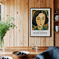 Matisse Art Prints - Woman Portrait Wall Art displayed in a rustic dining setting featuring a woman with flowers.