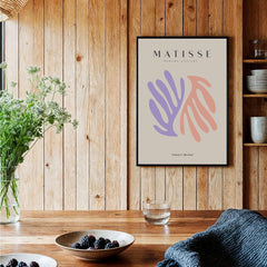 Matisse Art Prints - Purple Peach Abstract Leaves Poster displayed in a wooden interior with plants and decor.