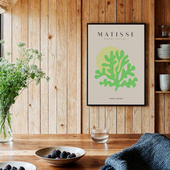 Matisse Art Prints - Lime Green Coral Abstract Sun Print displayed in a cozy, modern kitchen with wood accents.