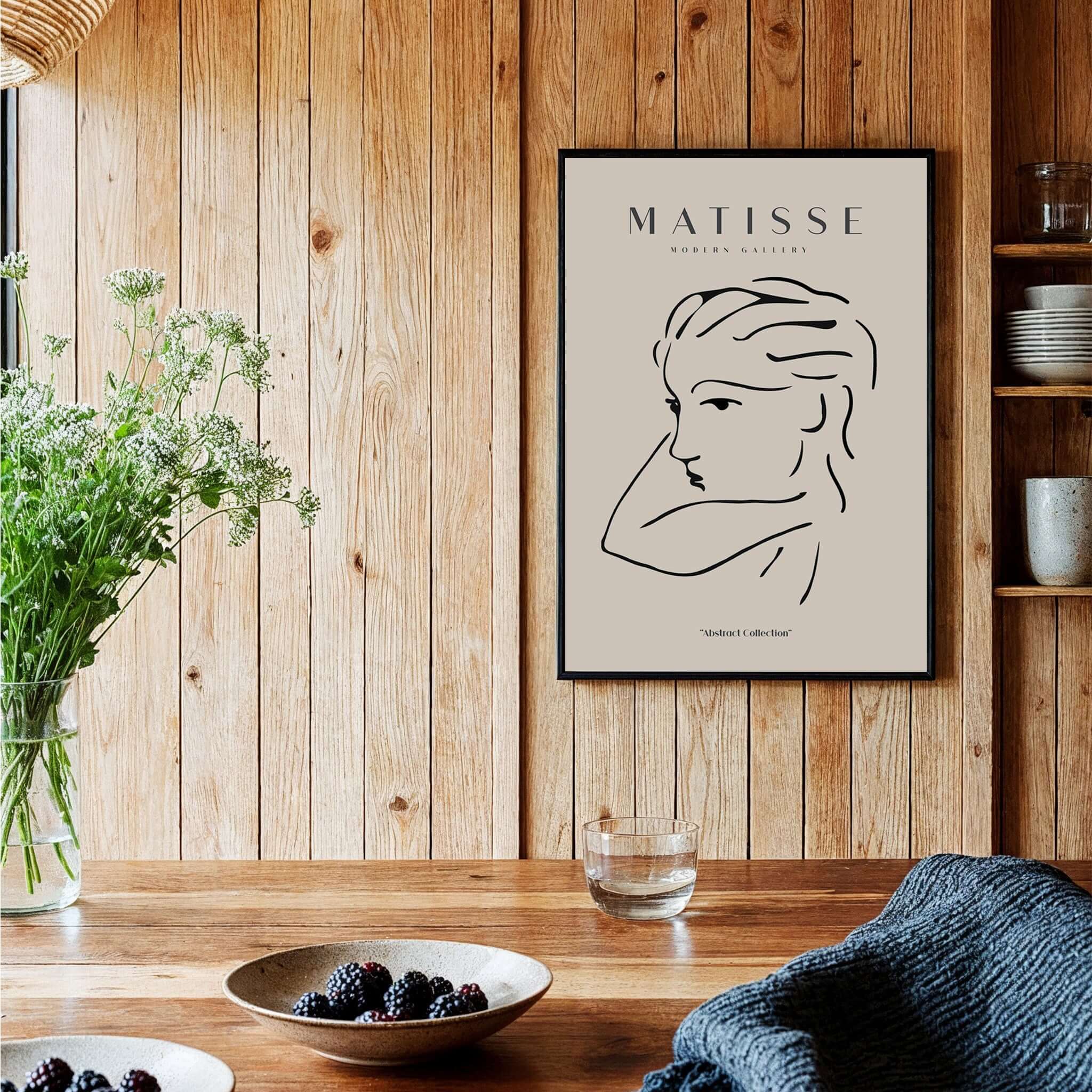 Matisse Art Prints - Abstract Line Drawing of Lady displayed in a modern kitchen setting with natural decor.