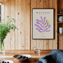 Matisse Art Prints - Purple Botanical Abstract Poster displayed in a modern kitchen with wood accents and plants.