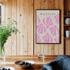 Matisse Art Prints - Pink Abstract Shapes Pattern Poster showcased in a rustic wooden setting with floral accents.