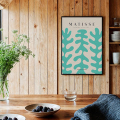 Matisse Art Prints - Teal Coral Pattern Abstract Wall Art displayed in a rustic interior setting with wooden paneling.