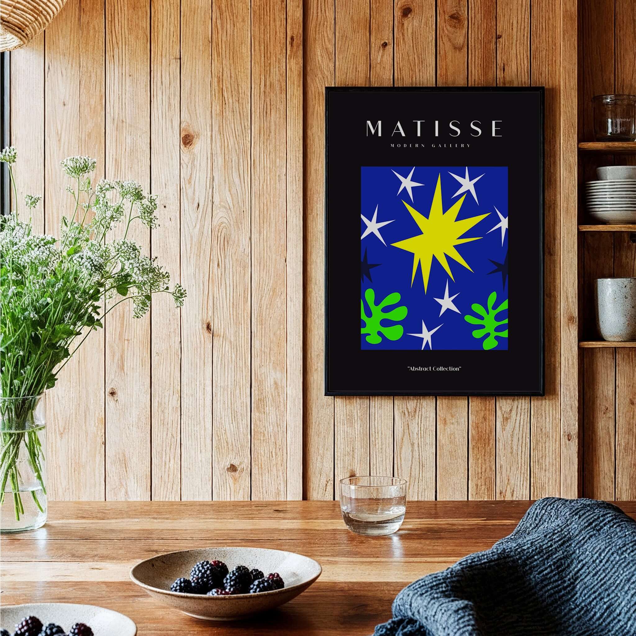 Matisse Art Prints - Stars Leaves Night Sky Abstract Print displayed on a wooden wall with greenery and decor.