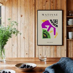 Matisse Art Prints - Purple Horse Abstract Figure Collage Poster displayed in a cozy interior with a wooden backdrop.