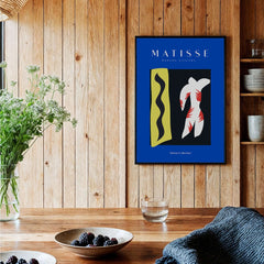 Matisse Art Prints - Icarus Jazz Abstract Art Print Blue displayed in a rustic home setting with wooden walls.
