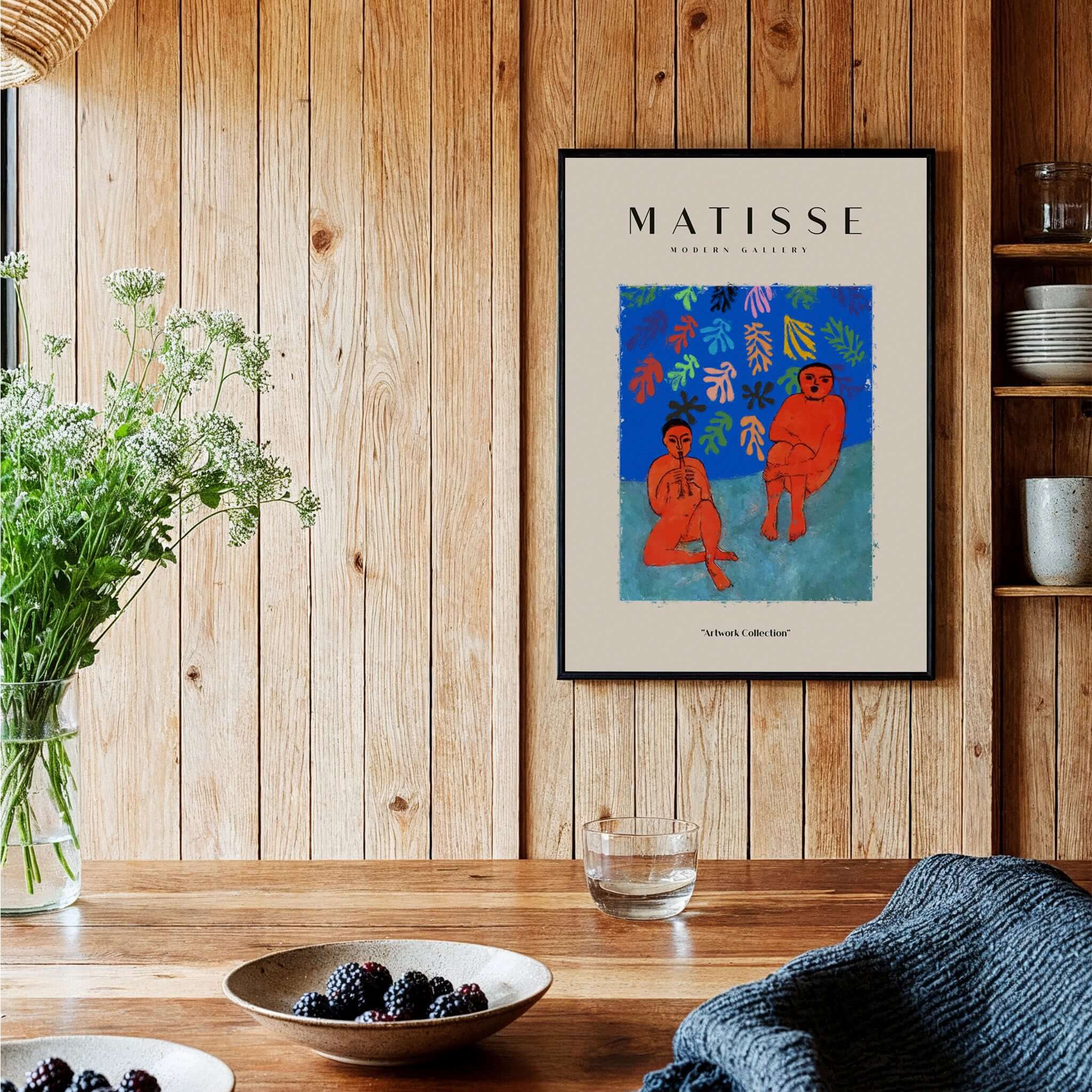 Matisse Art Prints -  Two Figures Flute Poster displayed on a wooden wall, featuring expressive orange figures and vibrant colors.