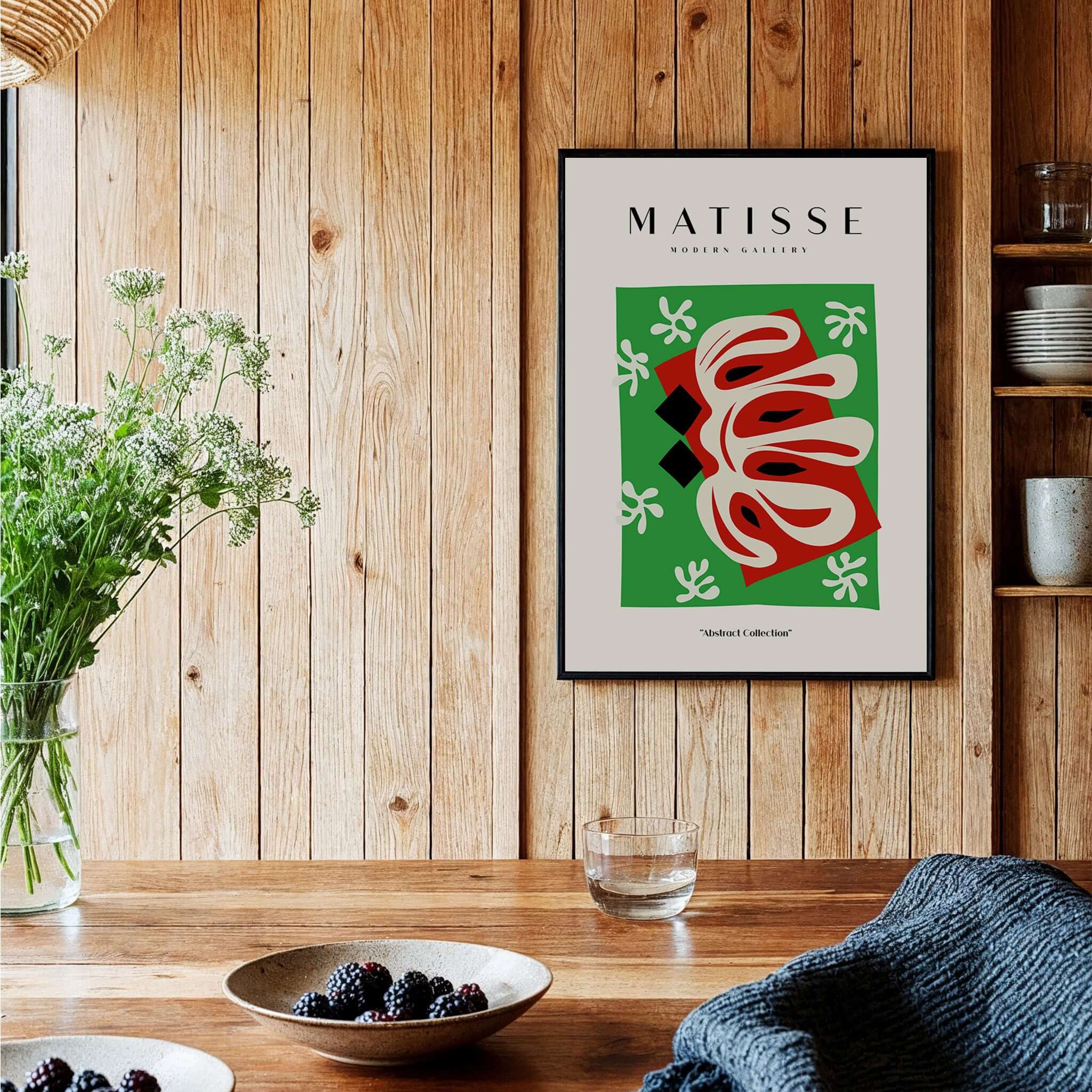 Matisse Art Prints -  Abstract Shape Red Green Poster displayed in a stylish interior with wooden walls and plants.