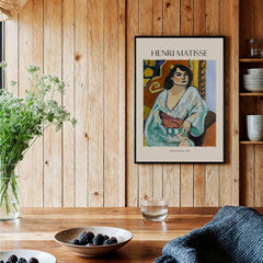 Matisse Poster - Algerian Woman 1909 Fauvist Wall Art Print displayed in a stylish wooden interior.