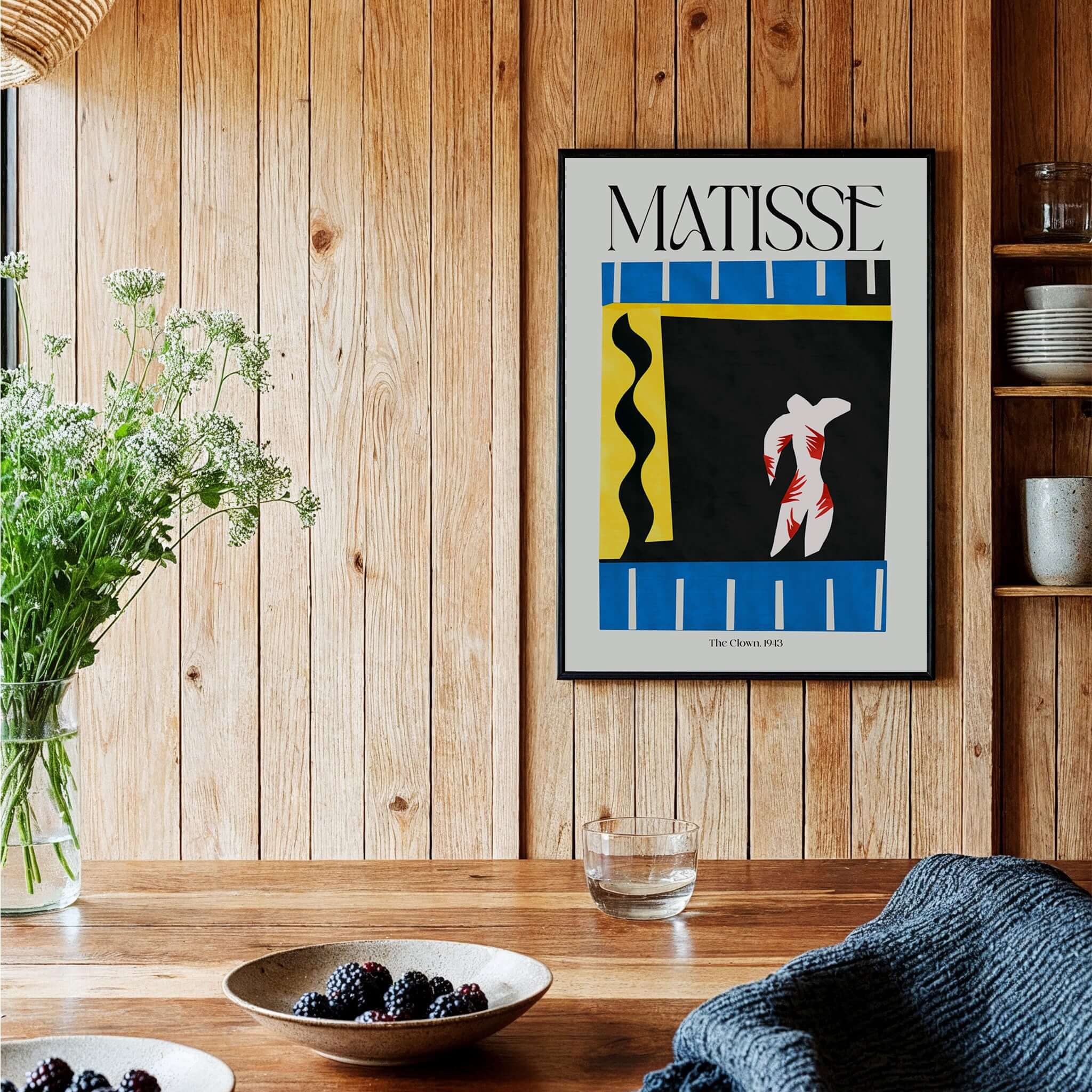 Matisse Art Print - The Clown 1943 Jazz Series Abstract Figure Poster displayed in a wooden interior with plants.