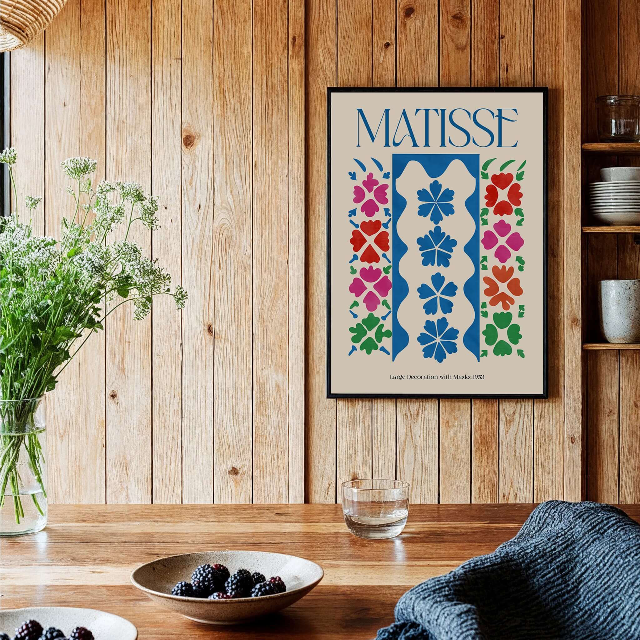 Matisse Large Decoration with Masks Vertical Panel Art Print displayed on wooden wall with flowers and table decor.