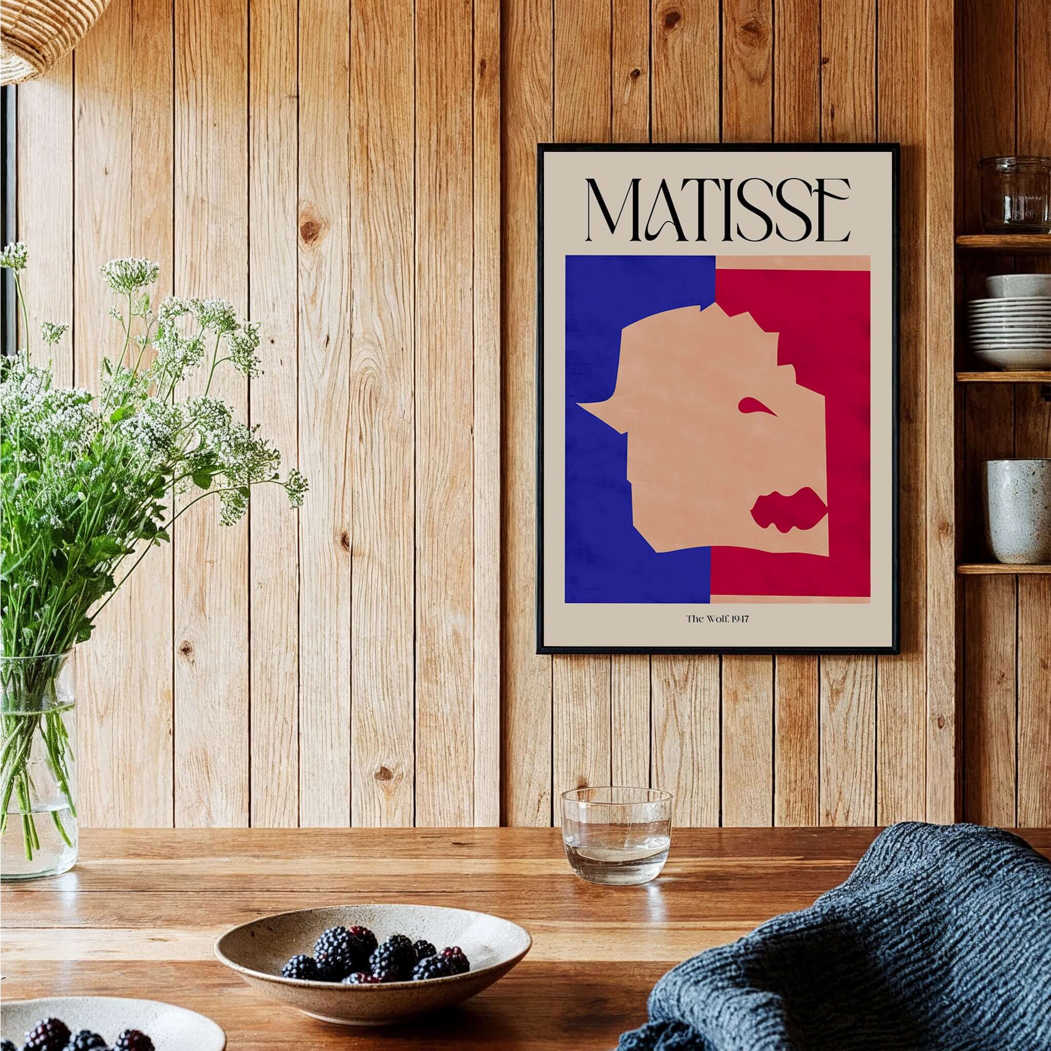 Matisse The Wolf 1947 Papiers Découpés Poster Print displayed in a stylish interior setting with wooden accents.