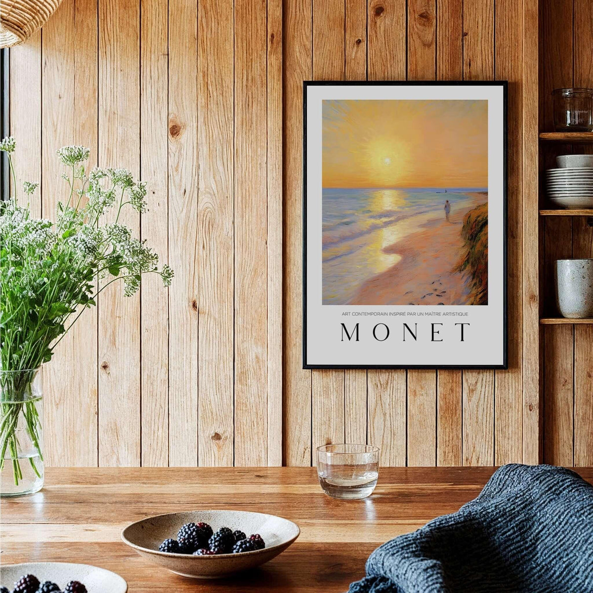 Claude Monet Art Print - Golden Hour Beach Stroll Wall Art displayed on a wooden wall with flowers and fruit.