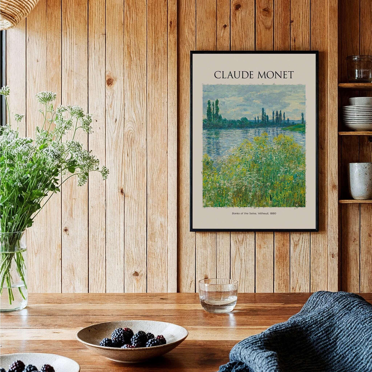 Monet Banks of the Seine Vétheuil River Landscape Art Print Poster displayed in a cozy wooden interior setting.