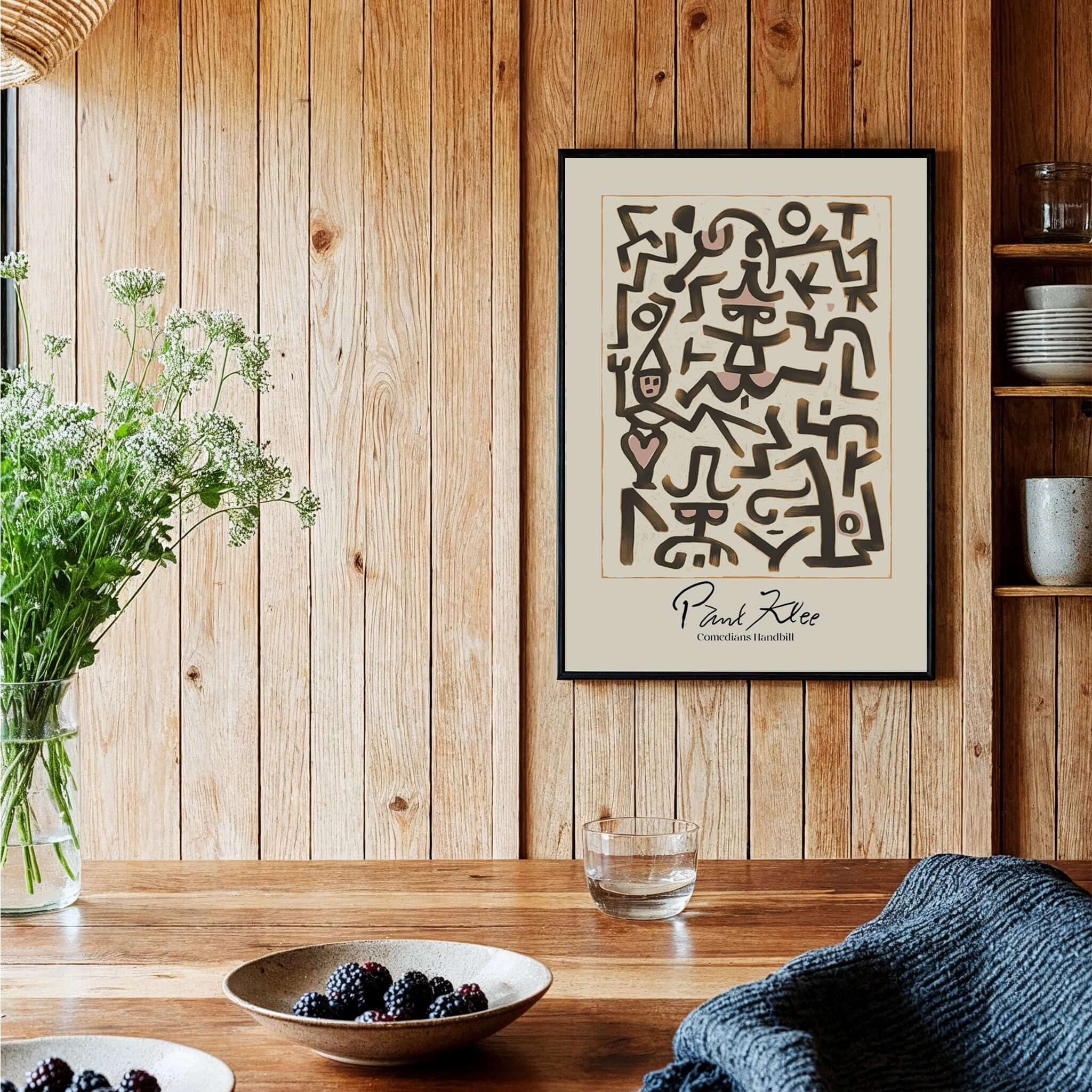 Paul Klee Comedians Handbill Abstract Figures Poster Modern Art Print displayed in a cozy home setting on wooden wall.
