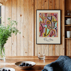 Paul Klee Park Bei Lu Colorful Abstract Landscape Poster Art Print displayed in a cozy interior with wooden accents.
