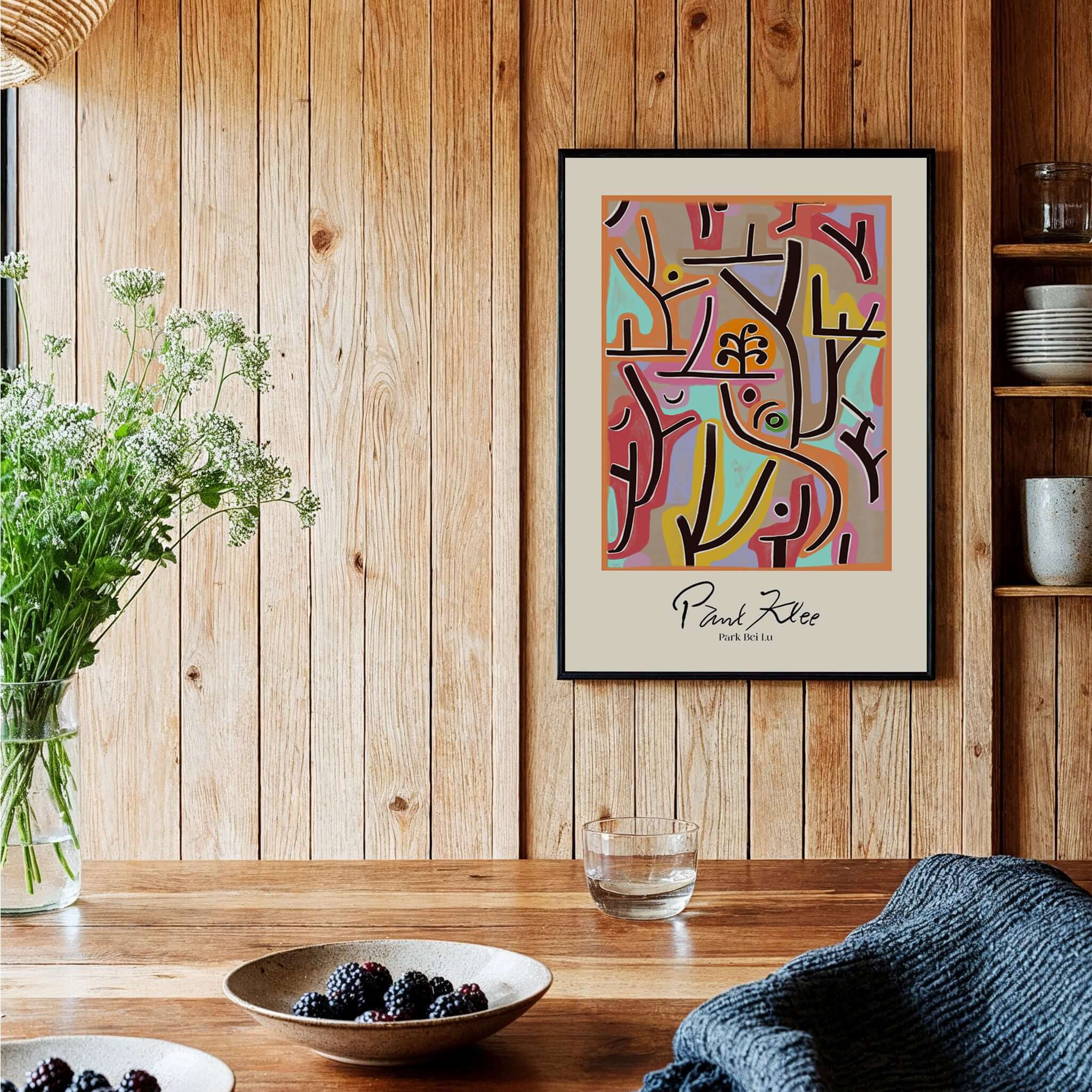 Paul Klee Park Bei Lu Colorful Abstract Landscape Poster Art Print displayed in a cozy interior with wooden accents.