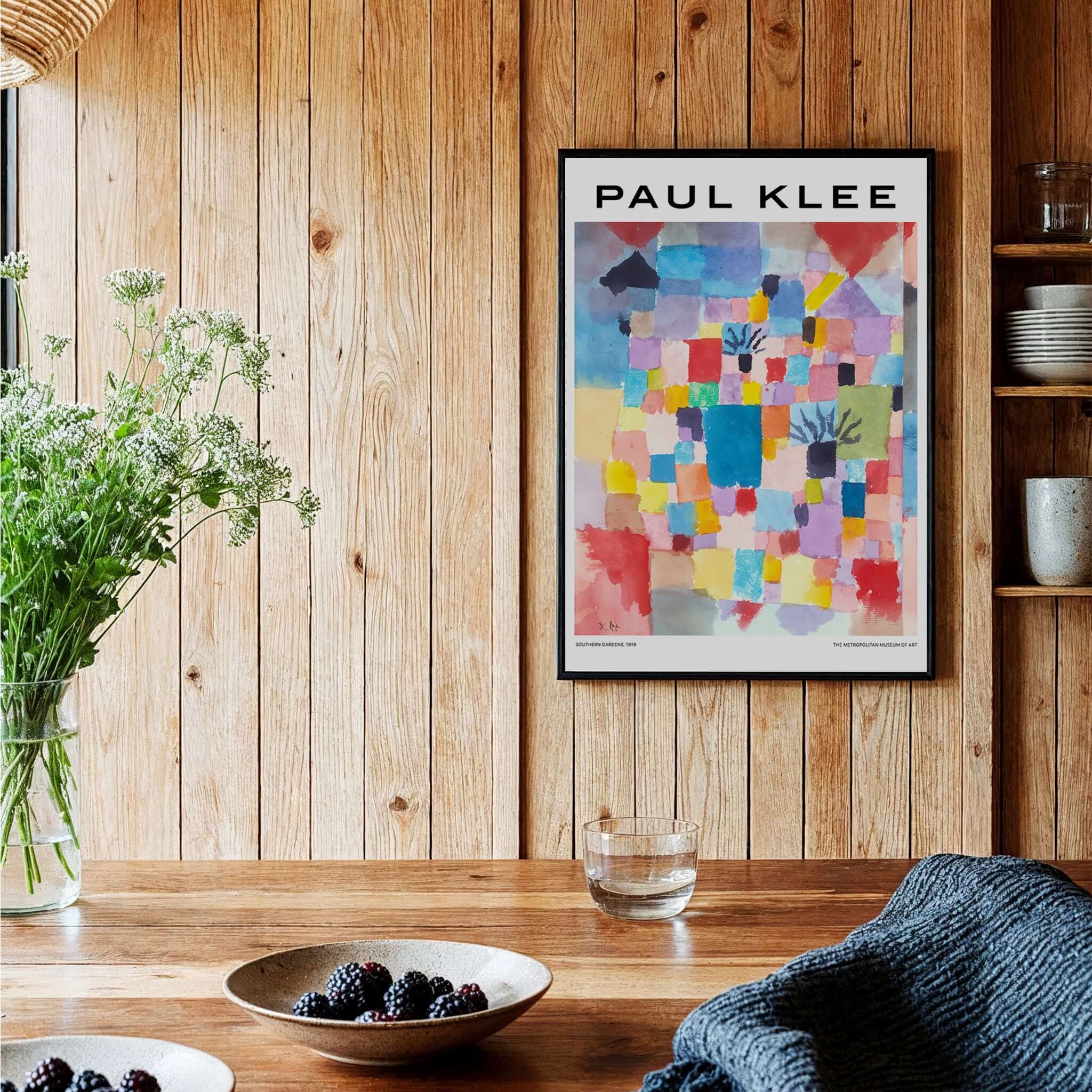 Paul Klee Southern Gardens Abstract Landscape Colorful Poster Art Print displayed in a cozy interior with wooden accents.