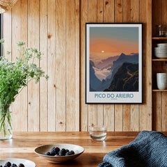 Framed Pico do Arieiro travel art print on wood wall in cozy kitchen with rustic decor