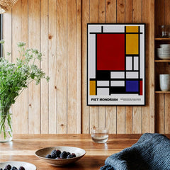Piet Mondrian Composition Red Yellow Blue 1939 De Stijl Poster Geometric Abstract Print displayed in a cozy interior.
