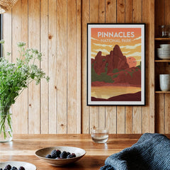 Framed Pinnacles National Park art print on wooden kitchen wall with berries and flowers