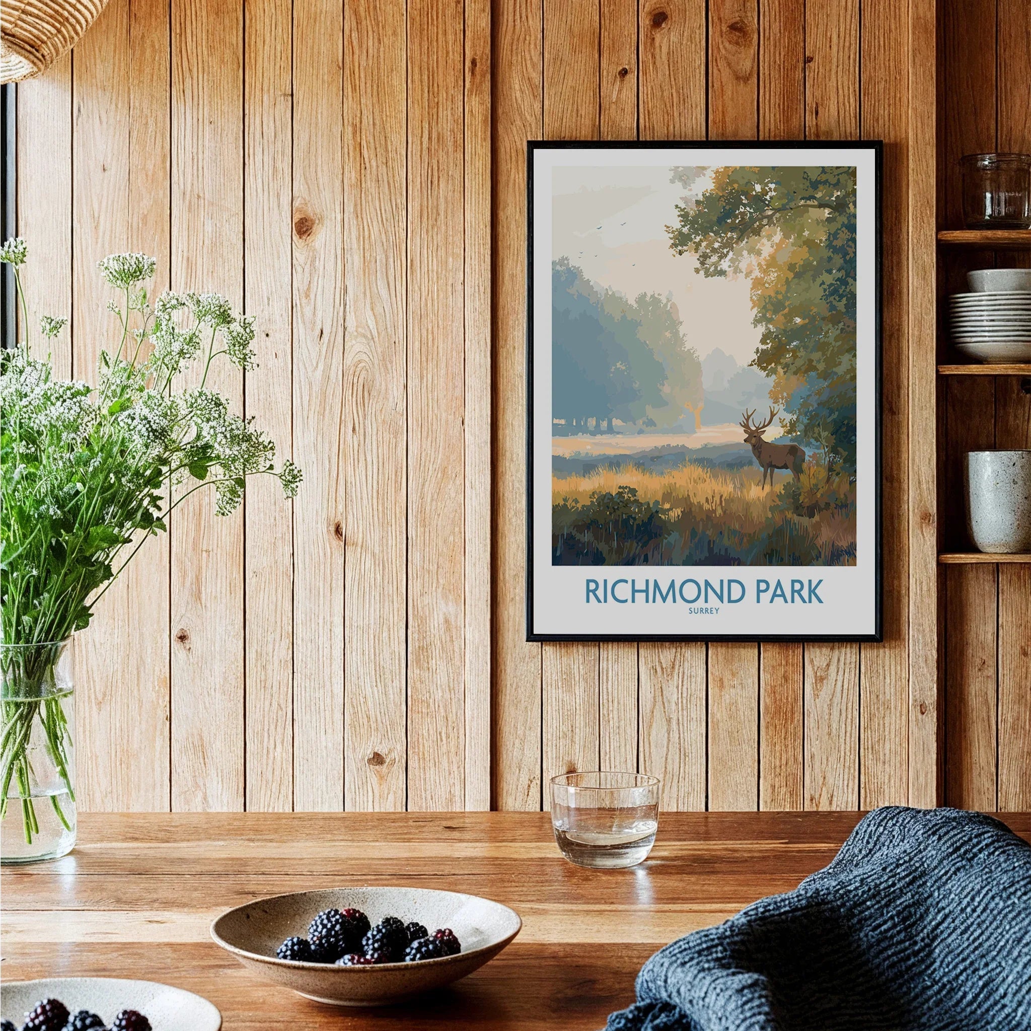 Richmond Park art print with deer, framed on wood wall in cozy kitchen setting