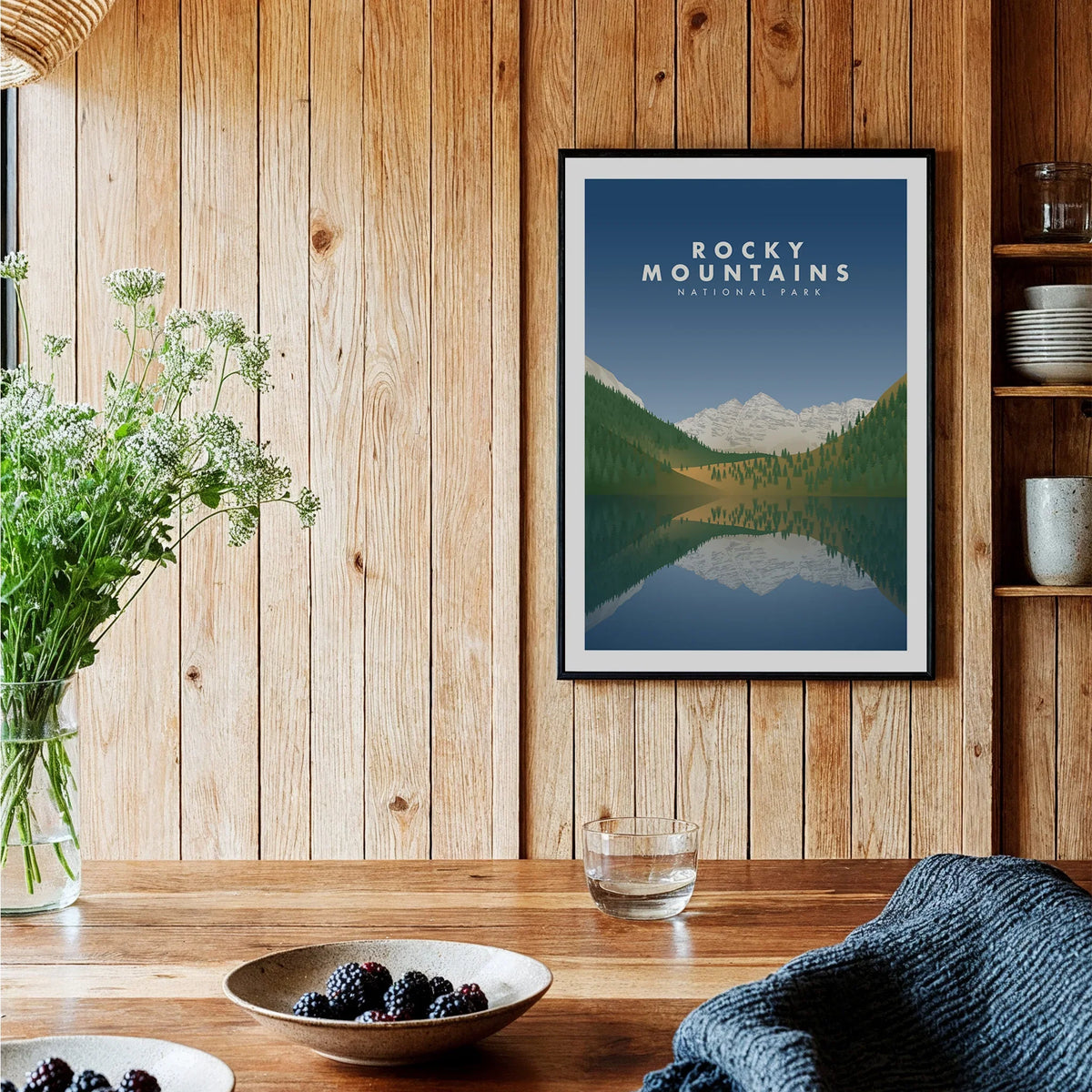 Rocky Mountains National Park art print in black frame, styled in a rustic kitchen setting