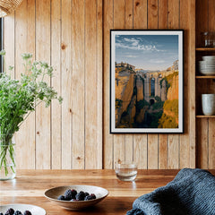 Ronda Spain Wall Art Print | Historic White Village Cliffside Travel Poster displayed in a rustic wooden setting.