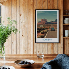 Route 66 travel poster framed on wood wall in cozy kitchen decor setting