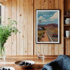 Route 66 travel poster wall art with vintage car, desert scene, framed in rustic kitchen