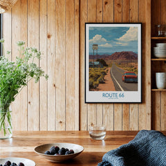 Route 66 travel poster art print in black frame on wood wall in rustic kitchen decor