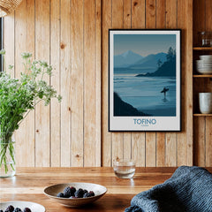 Tofino Canada Canvas Print | Misty Mountain & Shoreline Poster framed on a rustic wooden wall with coastal decor.