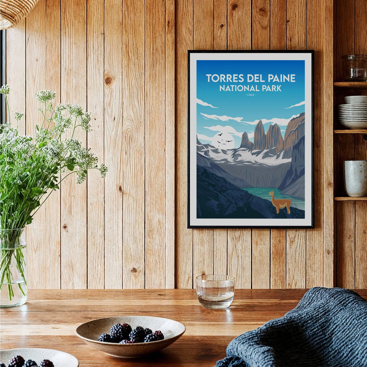 Torres del Paine National Park art print with mountains, lake, and deer in rustic kitchen