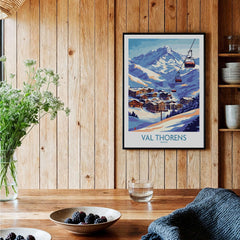Val Thorens Winter Sports Print | From the Top Ski Run View displayed in a wooden interior with a plant.