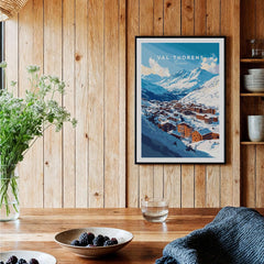 French Alps Ski Village Poster | Cosy Val Thorens Scene displayed in a cozy wooden interior with flowers.