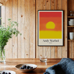 Andy Warhol Sunset Red Yellow Pop Art Abstract Print Modern Landscape Poster displayed in a cozy home interior setting.