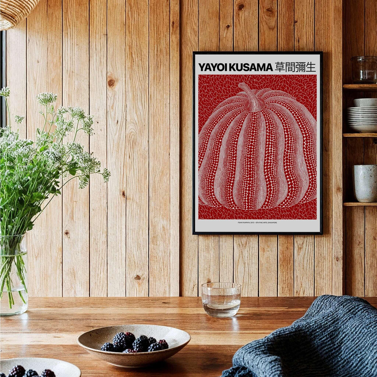 Yayoi Kusama Red White Pumpkin 2013 Singapore Exhibition Art Print Poster Polka Dot displayed in a cozy interior setting.